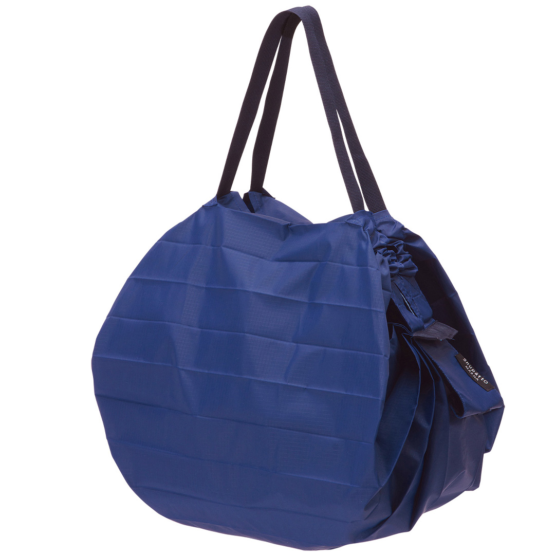 Läs mer om Shupatto Compact Bag Medium 15L Yoru