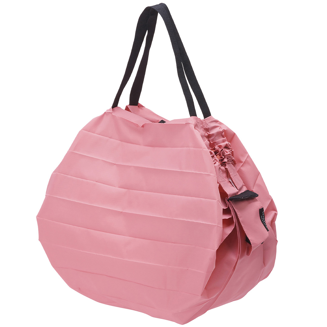 Läs mer om Shupatto Compact Bag Medium 15L Momo